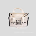 Black Letter Canvas Tote Bag on sale